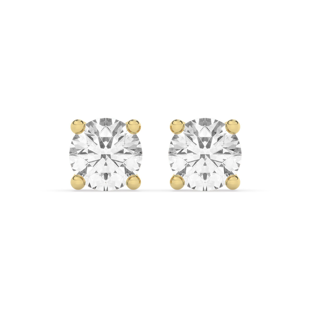 Aretes de oro con diamantes de 0.15 ct